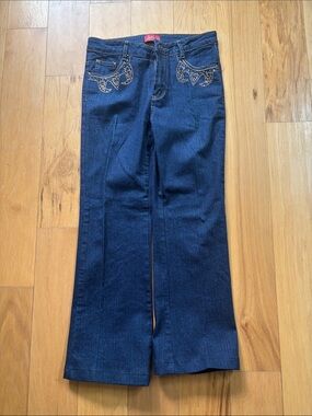 Azita embroidered and bedazzled dark blue jeans size 6.